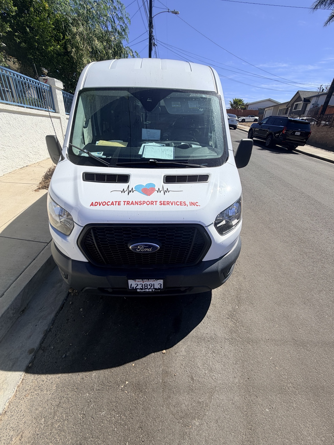 Front view of Advocate Transport Services van