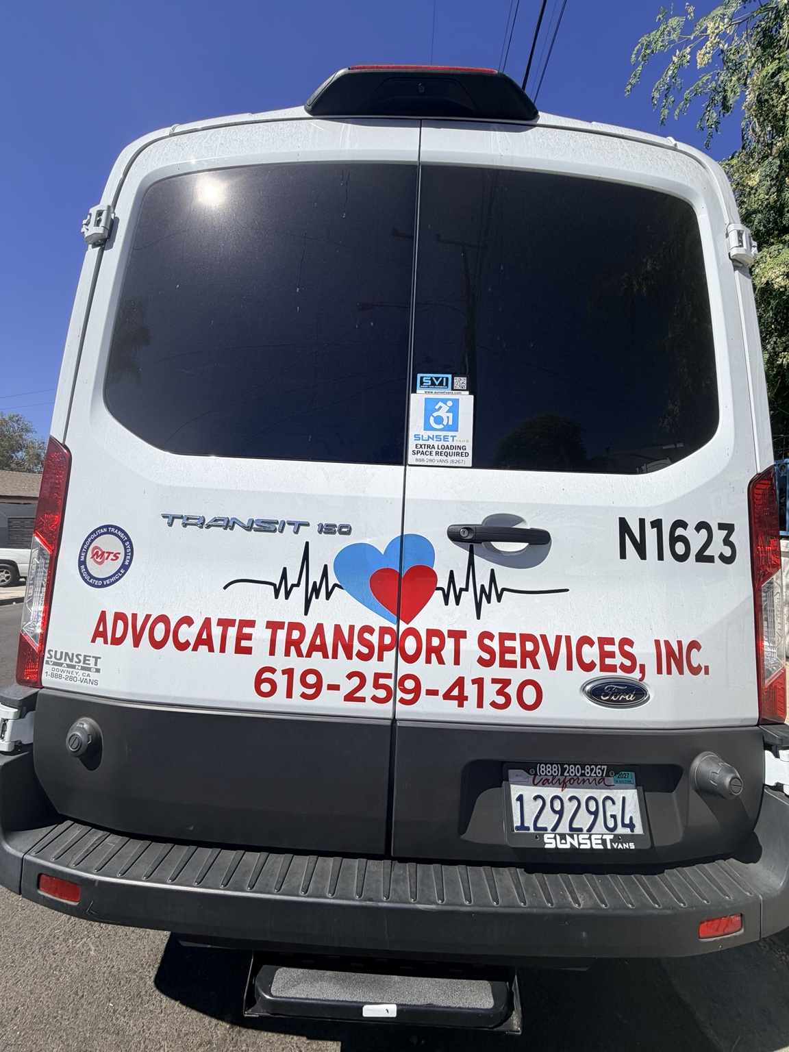 Rear view of accessible Advocate Transport Services van